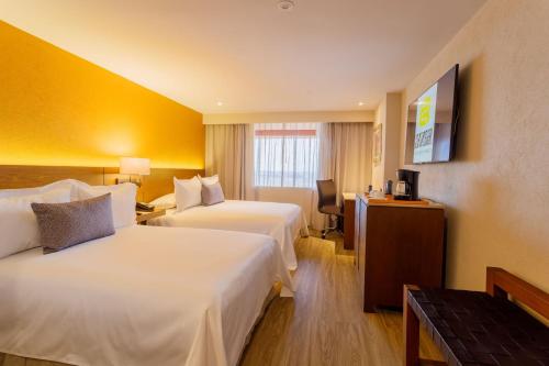 Alojamiento Camino Real Club con 2 camas y desayuno incluido solo para adultos del hotel Camino Real Aeropuerto Mexico. Foto 4