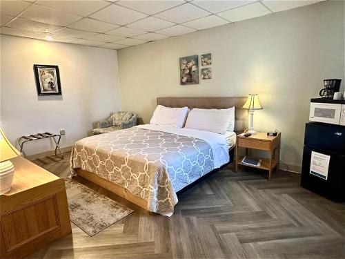 Habitación King del hotel Skaneateles Inn On 20. Foto 4
