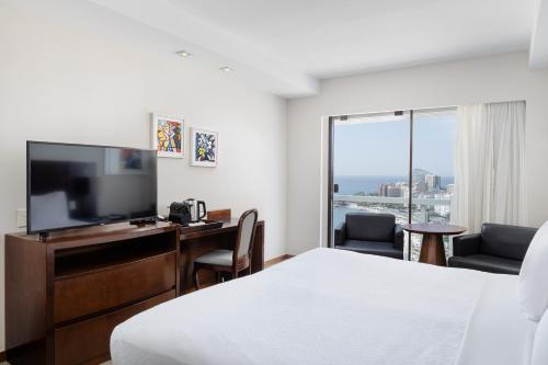 Habitación de lujo con vistas laterales al mar del hotel OTHON PALACE COPACABANA RIO. Foto 5