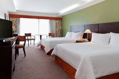 Habitación clásica con 2 camas grandes y vistas al mar del hotel Rio Othon Palace. Foto 3