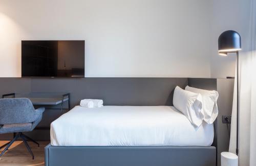 Habitación Triple del hotel Sb Madrid Norte. Foto 1