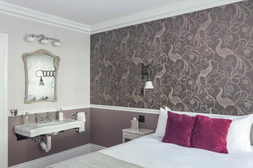 Habitación adaptada para personas con movilidad reducida - Cama grande del hotel Argos Inn
