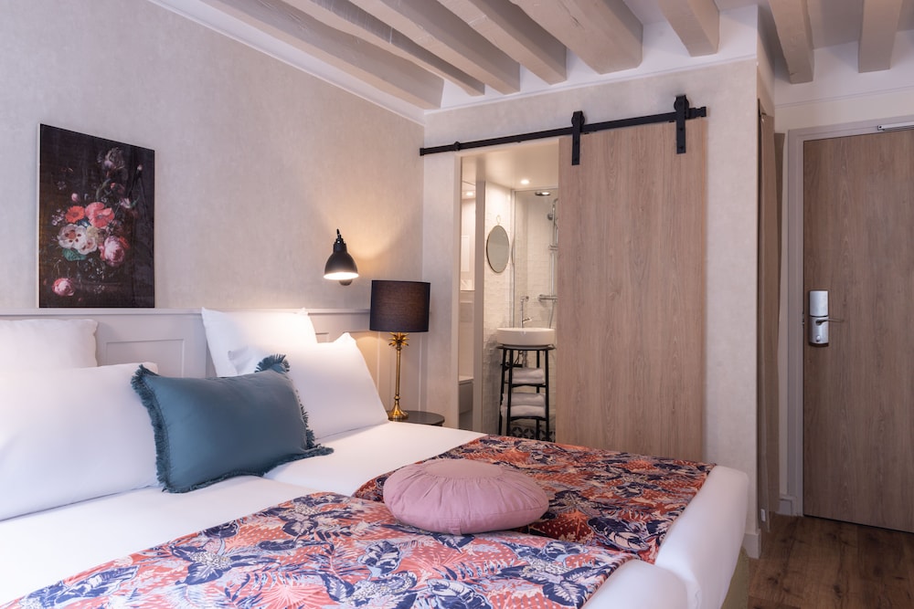 Habitación con 2 camas individuales del hotel Touraine Opera. Foto 1