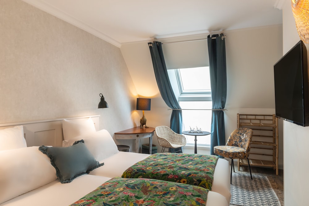 Habitación con 2 camas individuales del hotel Touraine Opera. Foto 5