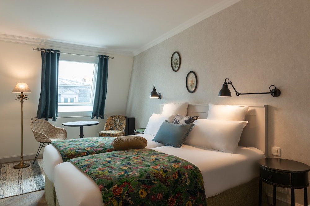 Habitación con 2 camas individuales del hotel Touraine Opera. Foto 6