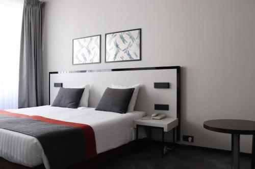 Habitación Doble Executive del hotel Floris Arlequin Grand Place. Foto 6