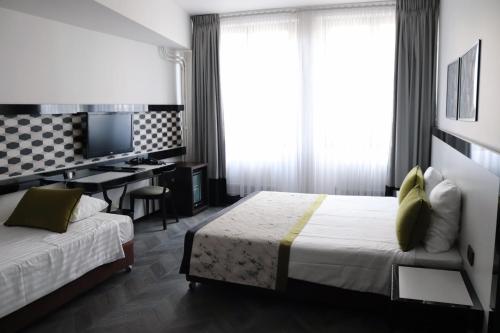Habitación Doble Executive del hotel Floris Arlequin Grand Place. Foto 16