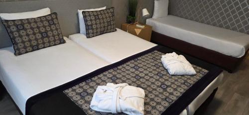 Habitación Triple Executive del hotel Floris Arlequin Grand Place. Foto 4