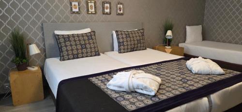 Habitación Triple Executive del hotel Floris Arlequin Grand Place. Foto 6