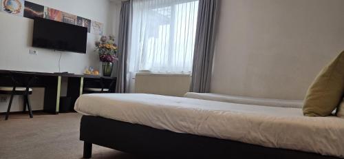 Habitación Cuádruple Estándar del hotel Floris Arlequin Grand Place