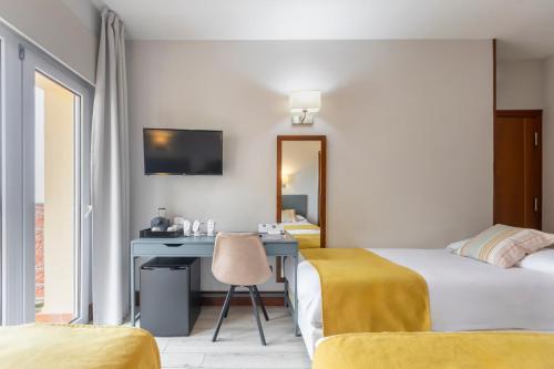 Habitación Triple con balcón del hotel Soho Boutique Los Naranjos. Foto 1