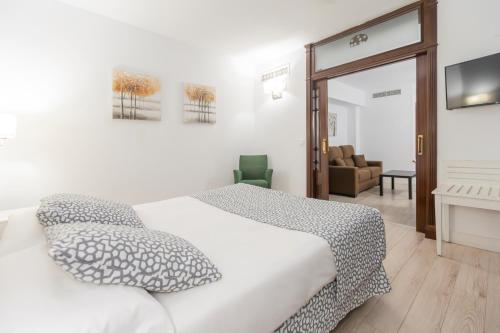 Habitación Familiar del hotel Soho Boutique Los Naranjos. Foto 6