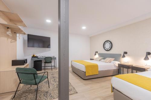 Habitación Familiar del hotel Soho Boutique Los Naranjos. Foto 16