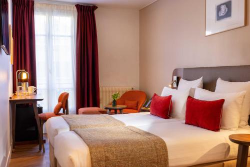 Habitación Twin Confort del hotel Europe Hotel Paris Tour Eiffel. Foto 3