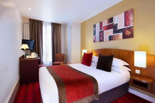 Habitación Doble acogedora del hotel Europe Hotel Paris Tour Eiffel. Foto 5