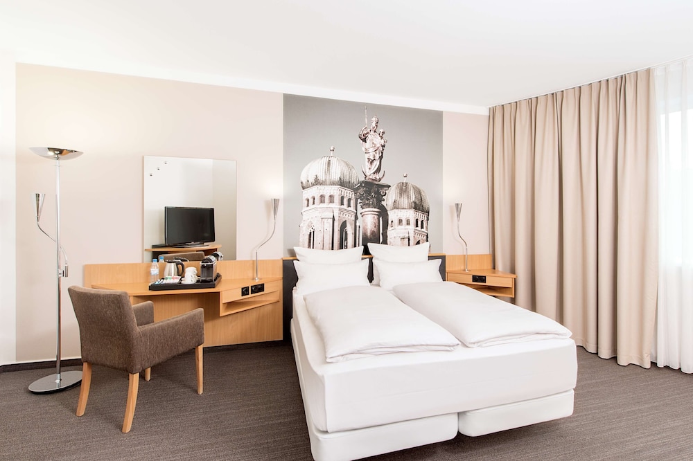 Habitación familiar Normal del hotel Nh München Messe. Foto 1
