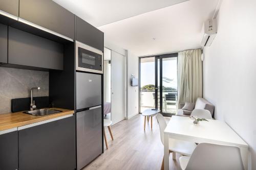 Apartamento Superior de 1 dormitorio (2 adultos + 2 niños de hasta 10 años) del hotel Comtat Sant Jordi. Foto 2