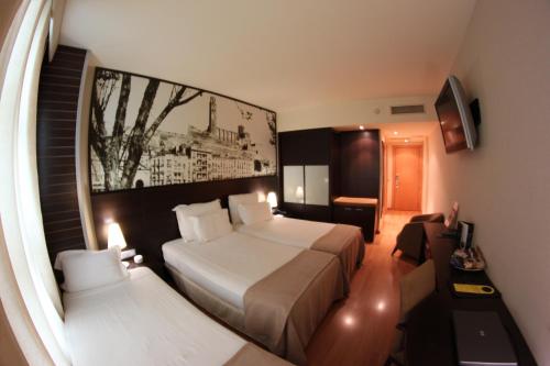 Habitación Triple Confort del hotel Nastasi Hotel & SPA. Foto 1