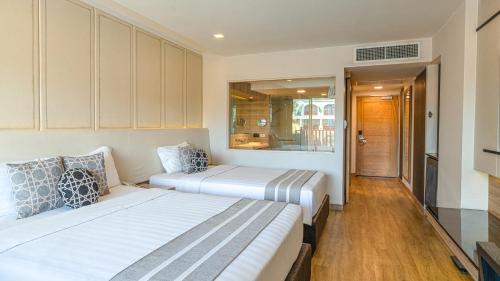 Habitación Deluxe del hotel Phuket Graceland Resort and Spa. Foto 4