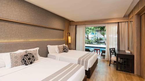 Habitación Familiar con acceso a la piscina del hotel Phuket Graceland Resort and Spa
