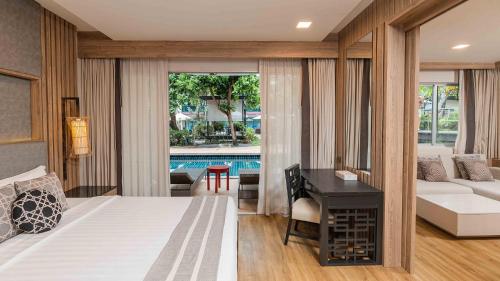 Habitación Familiar con acceso a la piscina del hotel Phuket Graceland Resort and Spa. Foto 3