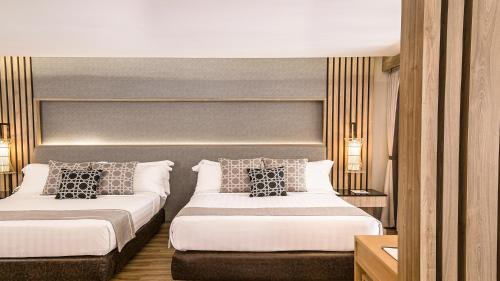 Habitación Familiar del hotel Phuket Graceland Resort and Spa. Foto 4