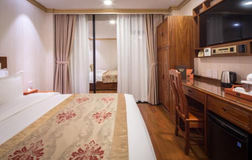 Habitación Deluxe con cama extragrande del hotel The Allen. Foto 1