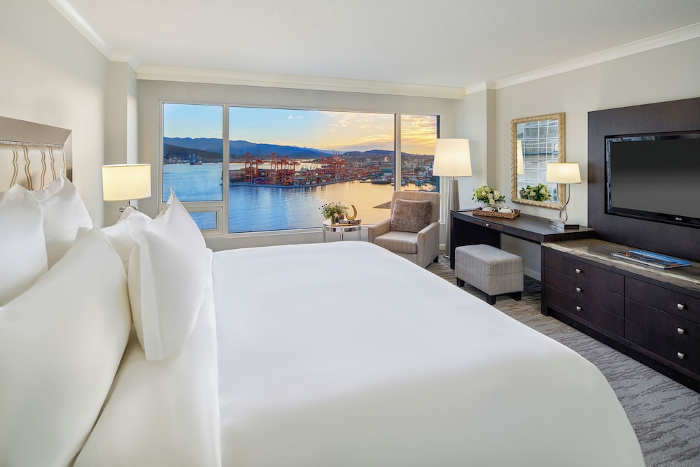 Habitación Signature, 2 camas dobles, vistas al puerto del hotel Fairmont Waterfront. Foto 5