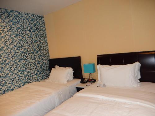 Habitación Doble con 2 camas dobles - No fumadores del hotel Quality Inn Near Sunset Park. Foto 1