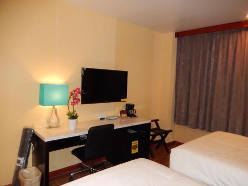 Habitación Doble con 2 camas dobles - No fumadores del hotel Quality Inn Near Sunset Park. Foto 3