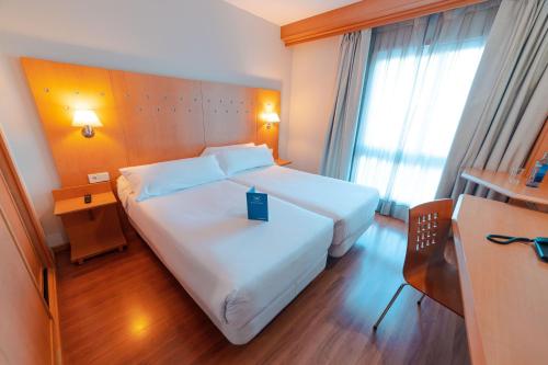 Habitación Doble - 2 camas del hotel Monte Rozas. Foto 1