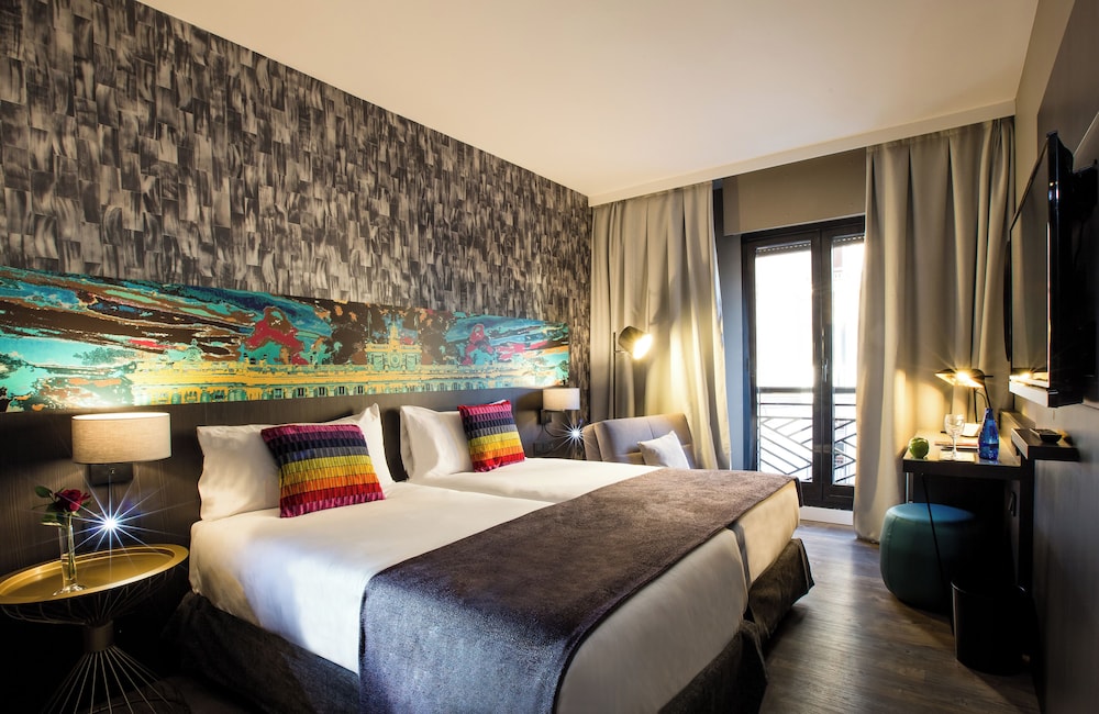 Habitación triple Confort del hotel Leonardo Boutique Madrid