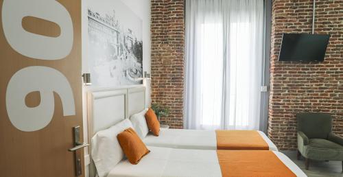Habitación Doble con vistas a la ciudad - 1 o 2 camas del hotel San Lorenzo. Foto 16