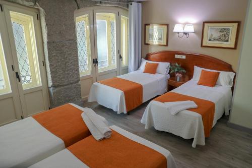 Habitación Cuádruple del hotel San Lorenzo. Foto 7