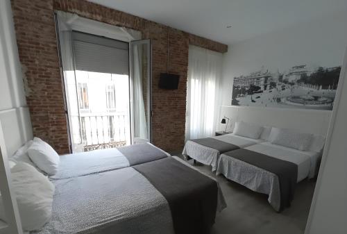 Habitación Cuádruple del hotel San Lorenzo. Foto 17