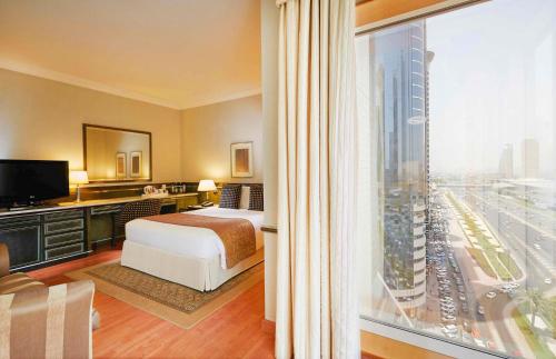 Habitación Club Executive del hotel Millennium Plaza Downtown