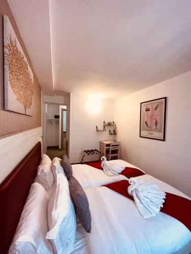 Habitación Doble - 2 camas del hotel Pavillon Opera Lafayette. Foto 1