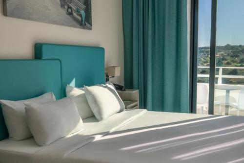 Habitación cuádruple del hotel Riviera Spa Resort – Adults Only. Foto 4