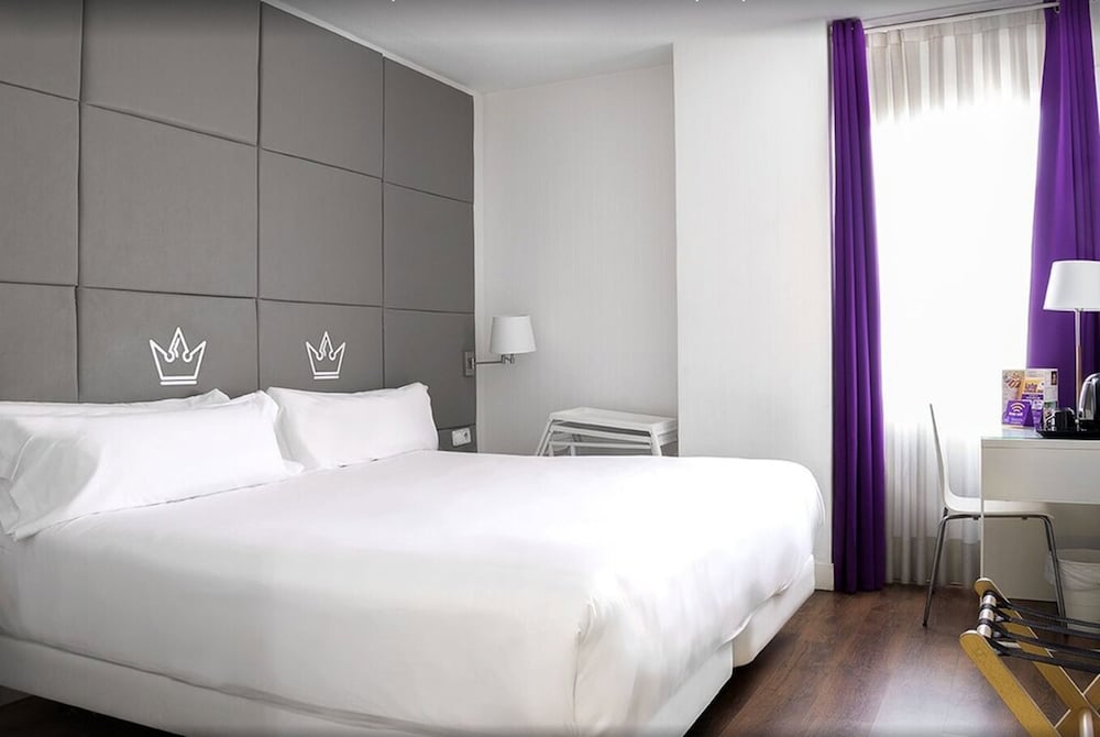 Habitación con 1 cama doble o 2 individuales del hotel Erase Un. Foto 1
