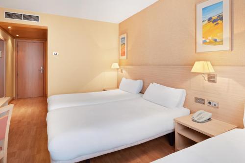 Habitación Triple del hotel B&B Tarragona Valls. Foto 1