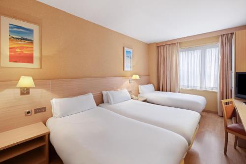 Habitación Triple del hotel B&B Tarragona Valls. Foto 3