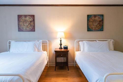 Habitación Doble con vistas al jardín del hotel Whispering Winds. Foto 7