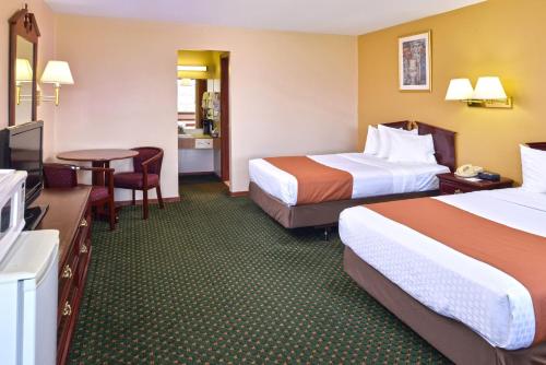 Habitación Doble con 2 camas dobles - No fumadores del hotel Americas Best Value Inn Plattsburgh. Foto 3