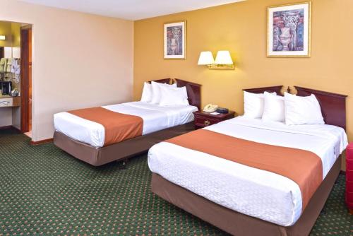 Habitación Doble - 2 camas dobles - Fumadores del hotel Americas Best Value Inn Plattsburgh. Foto 2