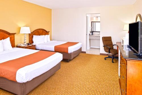 Habitación Doble - 2 camas dobles - Fumadores del hotel Americas Best Value Inn Plattsburgh. Foto 5