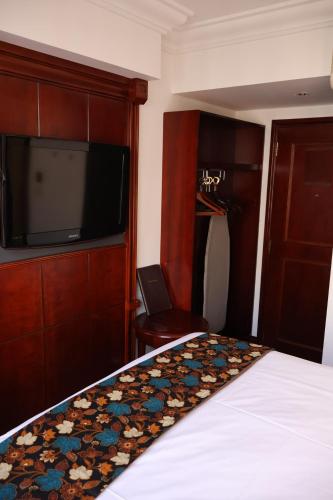 Habitación Triple Deluxe del hotel Dreamtel London Kensington