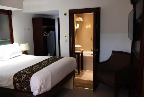 Habitación doble Lujo 1 Cama doble del hotel Dreamtel London Kensington. Foto 11