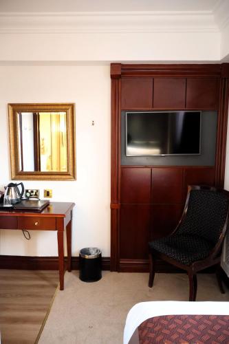 Habitación individual Superior 1 Cama Individual del hotel Dreamtel London Kensington. Foto 9