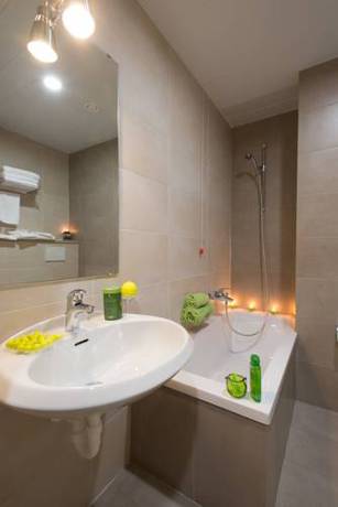 Habitación Triple del hotel B&B Milano Ornato. Foto 1