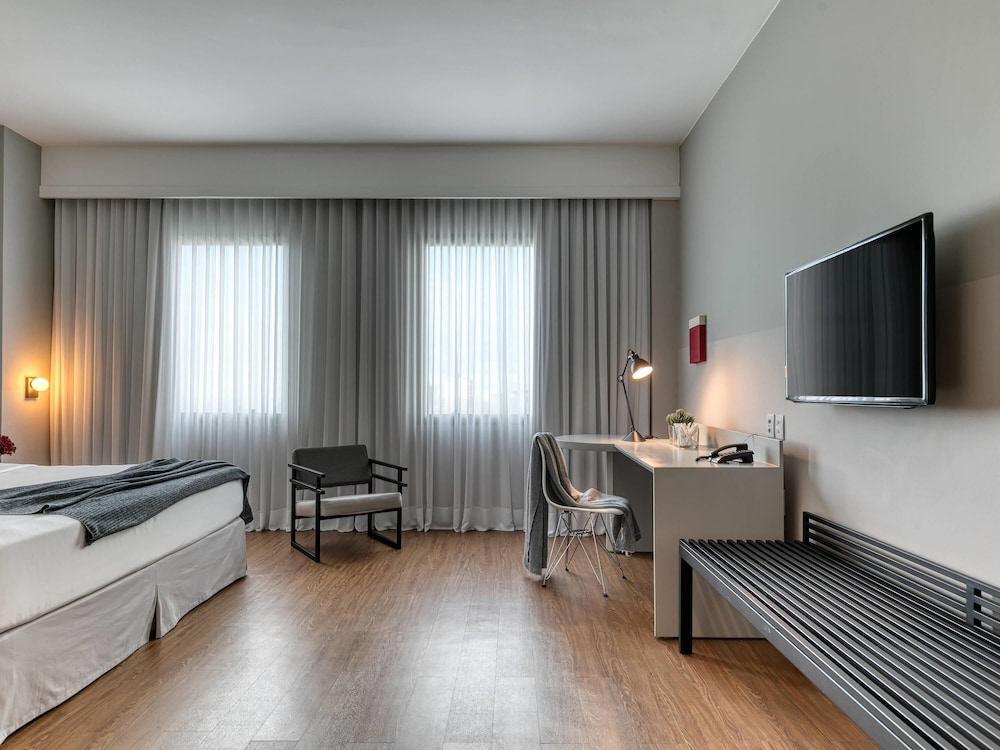 Habitación Premium con 1 cama king size del hotel Caesar Business Belo Horizonte Belvedere. Foto 1